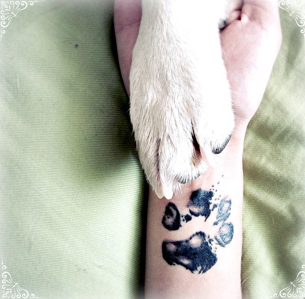 Black-paw-dog-tattoo